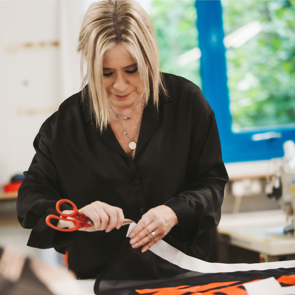 Karen Topham Finishing Sewing Flag